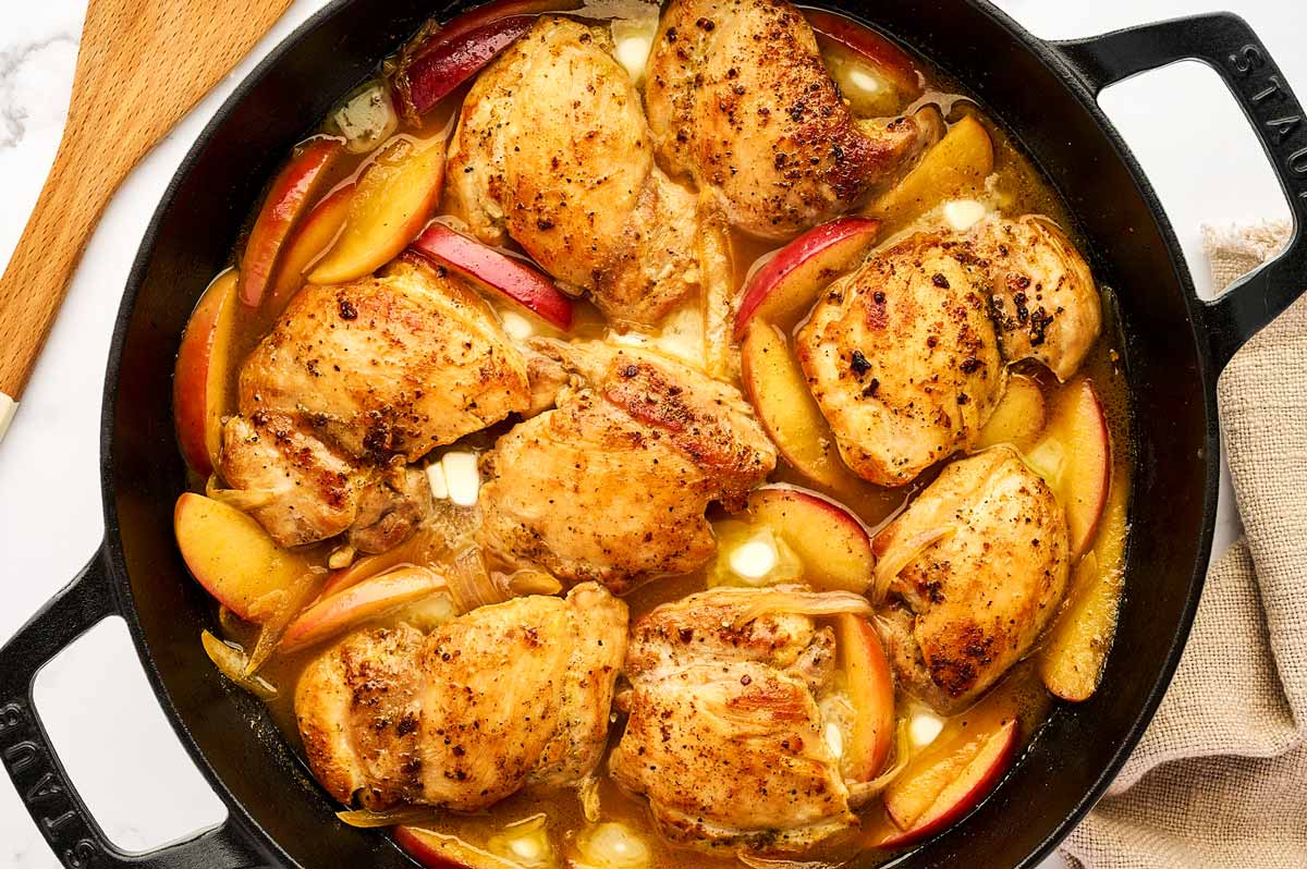 Apple chicken skillet being finished.