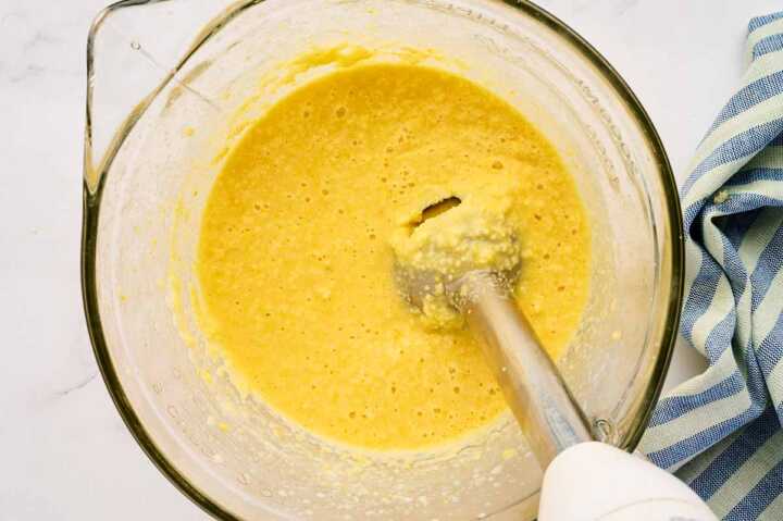 Blending cornbread batter.